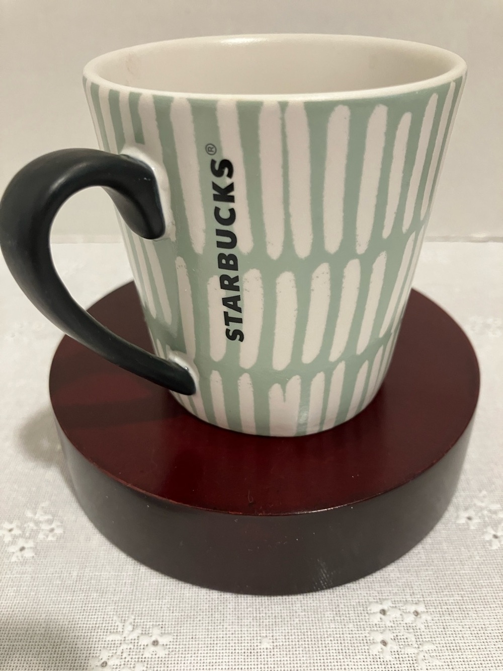 Starbucks Mint Green & White Vertical Dash Ceramic Mug with Black Handle.